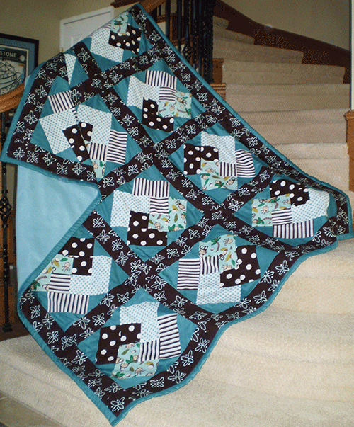 winning hand quilt, charity quilt, quanket
